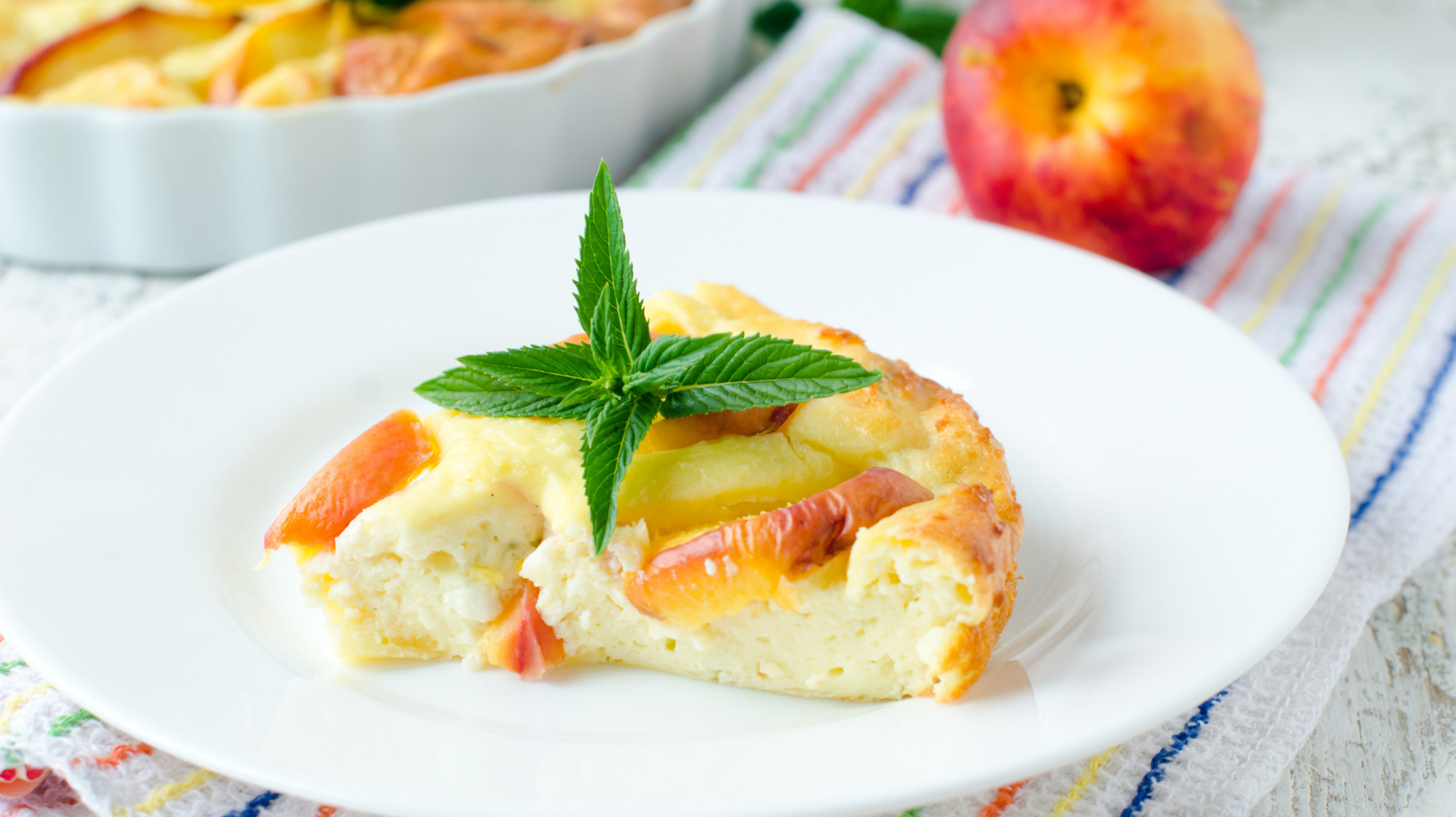 Käsekuchen mit Pfirsich: Fruchtig-cremiger Sommer-Traum - gofeminin
