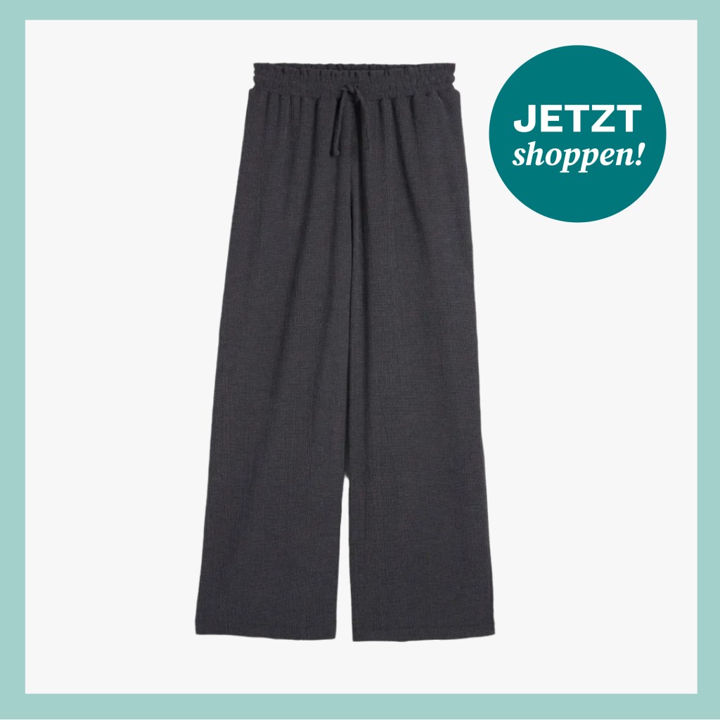 Dunkelblaue Hose aus Jersey-Stoff mit weitem Bein und Gummizug in der Taille