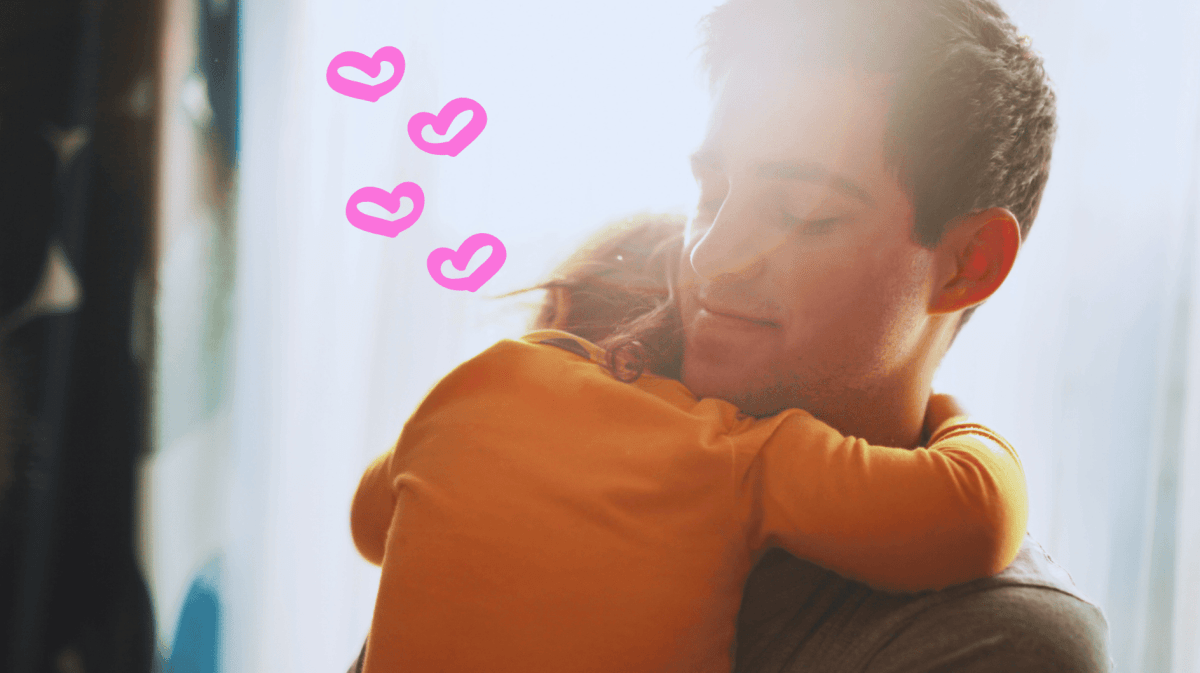 Papa hat Kind auf dem Arm und kuschelt, daneben Herzen